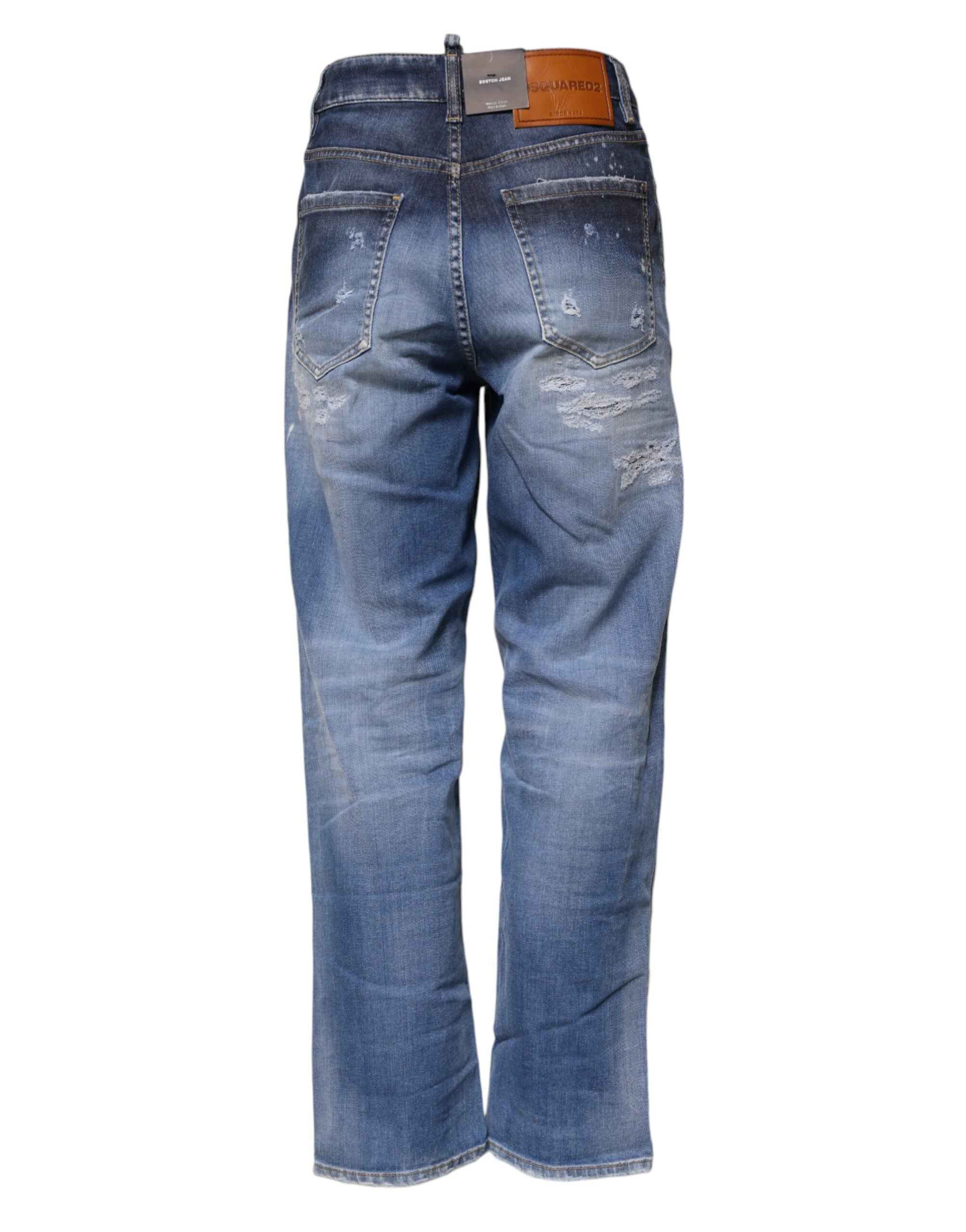 Blue Tattered Cotton Mid Waist Straight Denim JeansDSQUARED2 Gorgeous brand new, 100% Authentic DSQUARED2 denim jeans. Color: Blue Model: Mid waist straight jeans Material: 92% Cotton 6% Elastomultiester 2% Elastane Button closure Logo details Made in Ita
