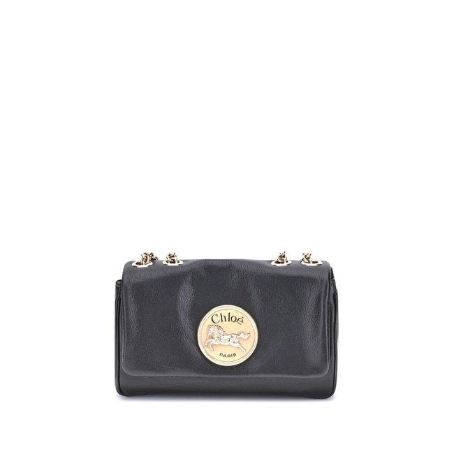 Black Calf Leather Bos Taurus Shoulder BagChloé’s Heritage Shoulder Bag is a refined and versatile accessory made of soft grained leather. Its aesthetic is embellished with a metallic logo detail on the front, underscoring its design identity. The metal c