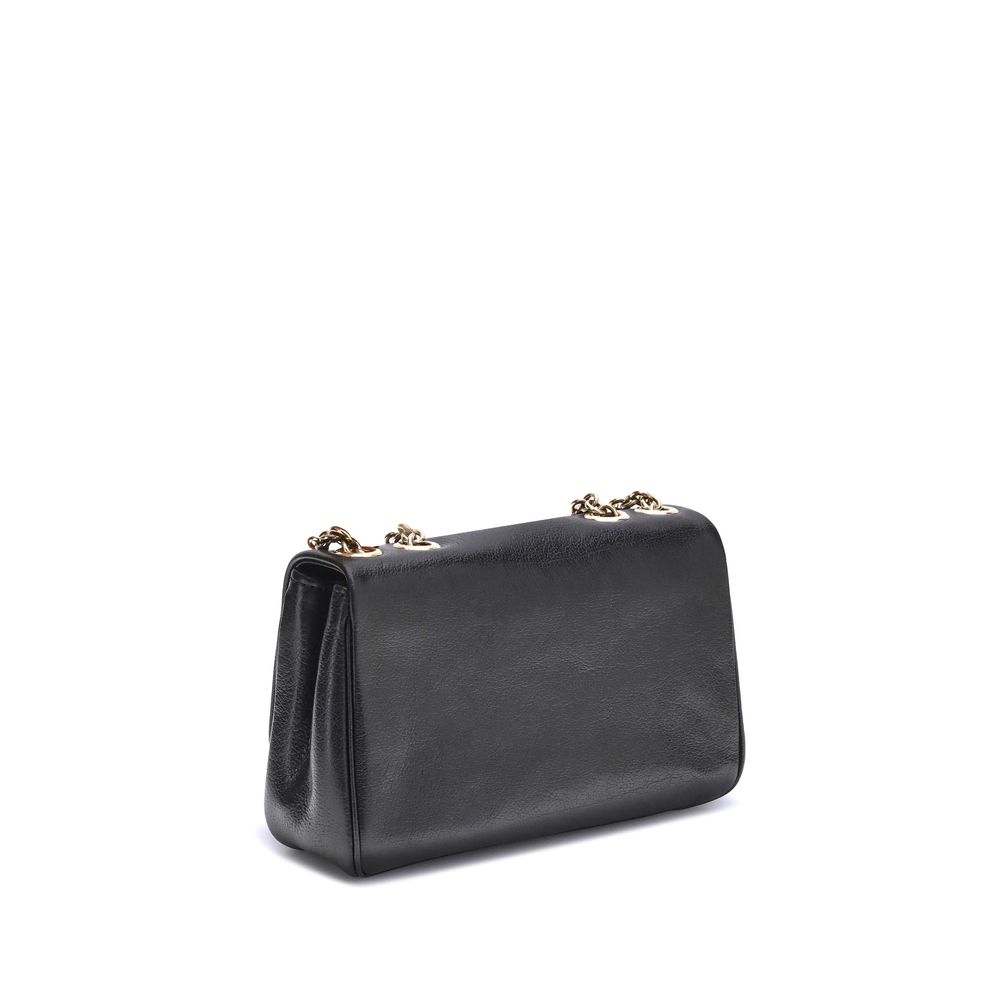 Black Calf Leather Bos Taurus Shoulder BagChloé’s Heritage Shoulder Bag is a refined and versatile accessory made of soft grained leather. Its aesthetic is embellished with a metallic logo detail on the front, underscoring its design identity. The metal c