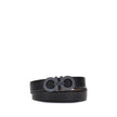 Black Calf Leather Bos Taurus Regular BeltFerragamo’s Gancini reversible Belt is an iconic accessory, featuring its distinctive Gancini buckle in a ruthenium finish. The buckle is embellished with fine vertical knurling, adding a touch of elegance. This m