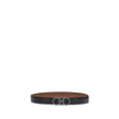 Black Calf Leather Bos Taurus Regular BeltFerragamo’s Gancini reversible Belt is an iconic accessory, featuring its distinctive Gancini buckle in a ruthenium finish. The buckle is embellished with fine vertical knurling, adding a touch of elegance. This m