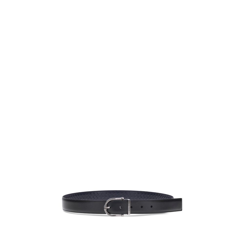 Black Calf Leather Bos Taurus BeltFerragamo’s Reversible leather Belt is a stylish and versatile accessory made from soft calfskin leather. Its two-tone reversible design offers effortless versatility, allowing you to pair it with a variety of outfits. Th
