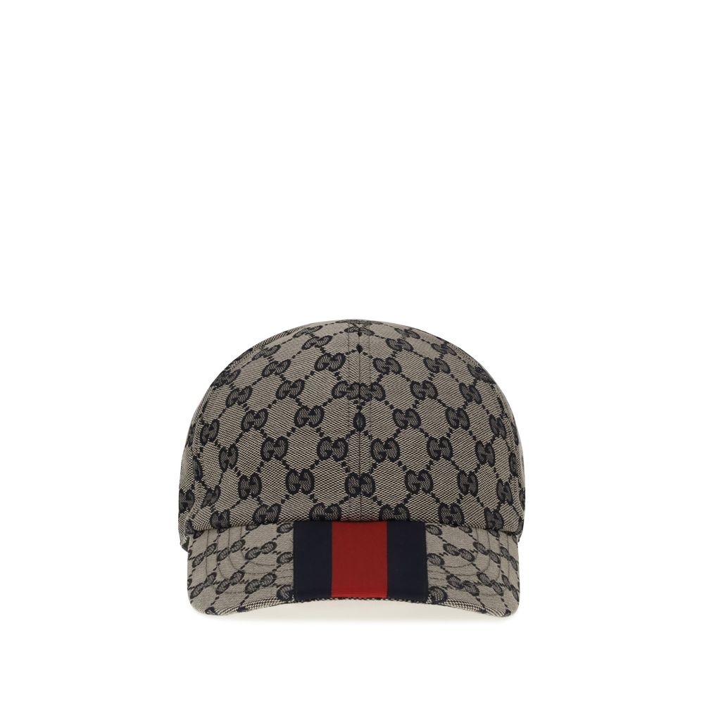 Baseball HatGucci’s Baseball Hat is an accessory with a distinctive and timeless style. Made with the iconic GG Supreme all-over jacquard print, it is embellished with the classic webbing bands on the visor, the unmistakable symbol of the house. The adjus