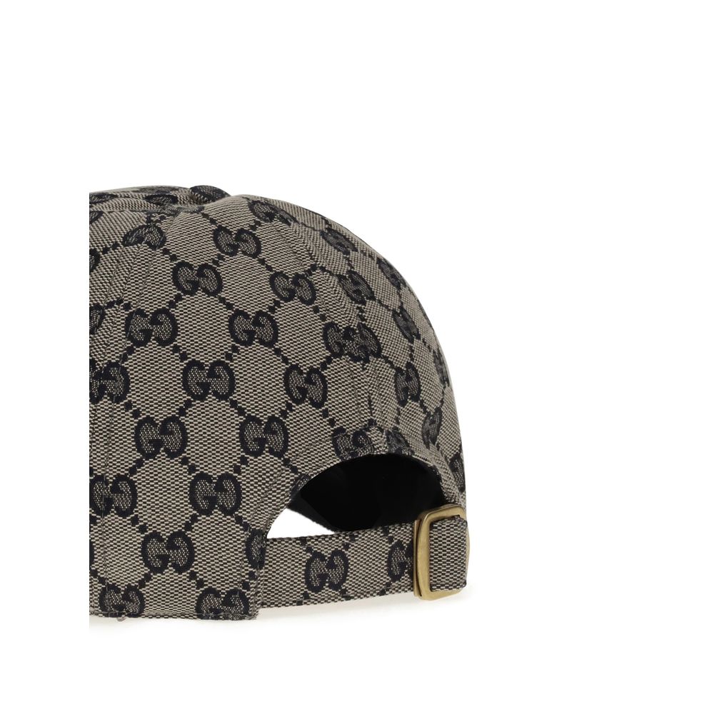 Baseball HatGucci’s Baseball Hat is an accessory with a distinctive and timeless style. Made with the iconic GG Supreme all-over jacquard print, it is embellished with the classic webbing bands on the visor, the unmistakable symbol of the house. The adjus