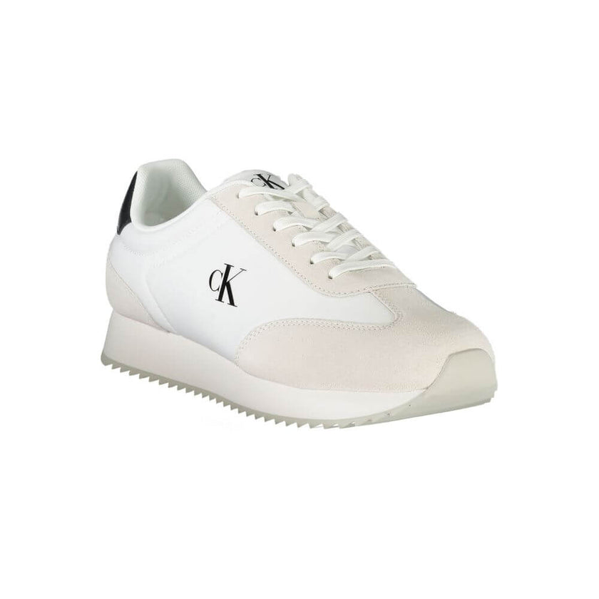 White Leather Men SneakerEmbrace the perfect fusion of comfort and style with the Calvin Klein sports sneakers. Punctuated by striking black details, these lace-ups boast a sleek silhouette complemented by a bold logo print that makes a statement on the m