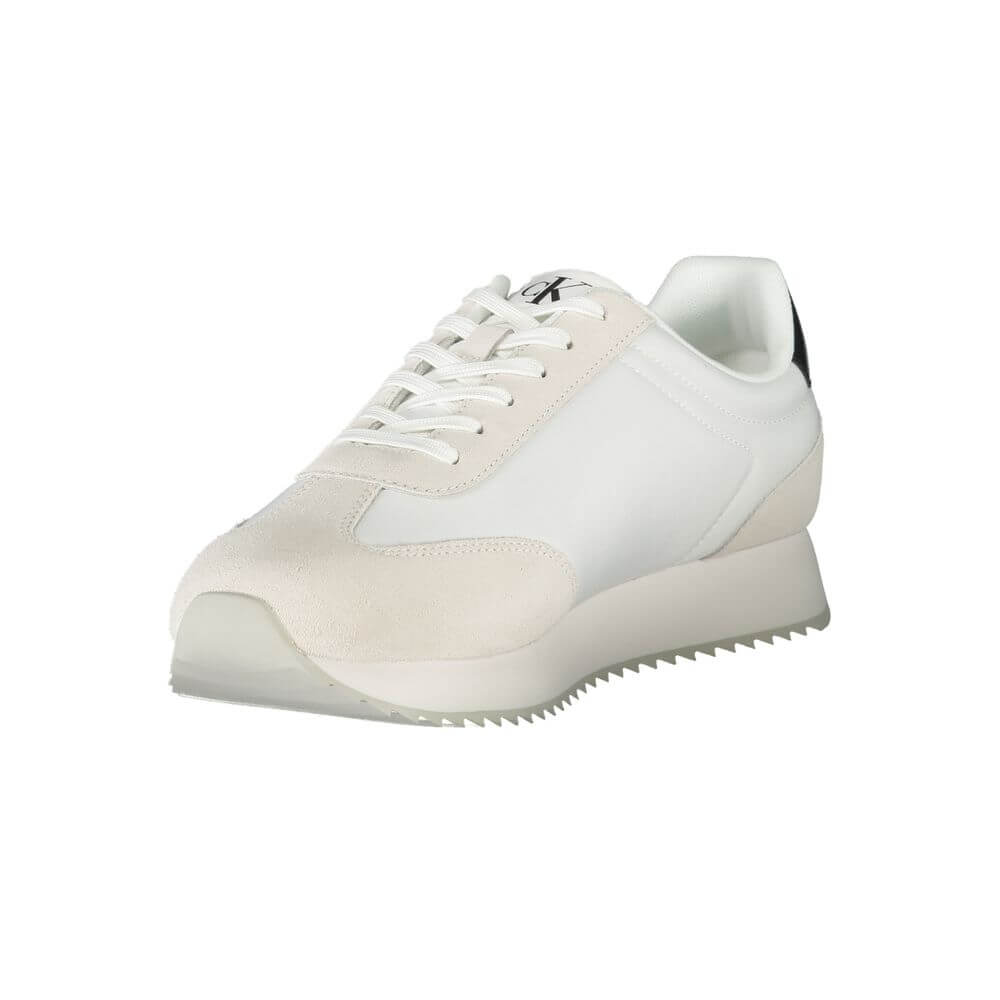 White Leather Men SneakerEmbrace the perfect fusion of comfort and style with the Calvin Klein sports sneakers. Punctuated by striking black details, these lace-ups boast a sleek silhouette complemented by a bold logo print that makes a statement on the m
