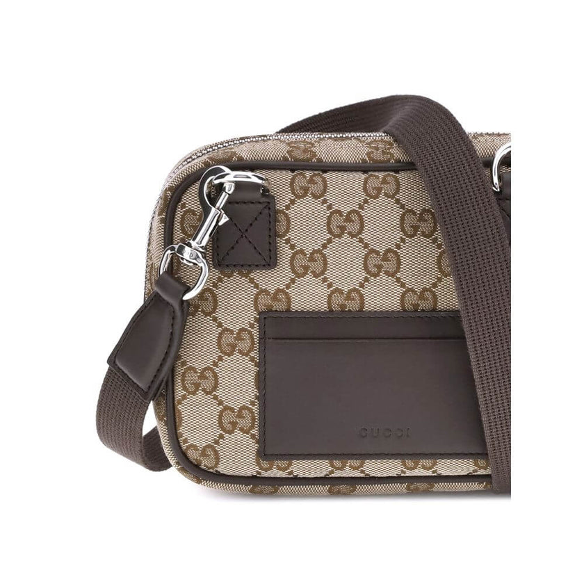 Brown Polyester Shoulder BagGucci’s GG Supreme Shoulder Bag is an iconic and versatile accessory that embodies the house’s distinctive style. Crafted in the unmistakable GG Canvas, it is finished with elegant dark brown leather details that create a pleas