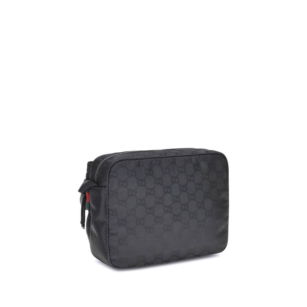 Black Polyester Shoulder BagThe Gucci Nexus Small Shoulder Bag is a practical and modern accessory. Made of durable black GG Nylon, it features the iconic green and red Web motif label and tone-on-tone Gucci logo, enhancing its discreet yet recognizable d