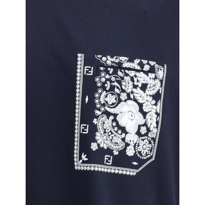Blue Cotton T-ShirtCotton T-Shirt by Fendi features a distinctive design with attention to detail. The front is enhanced by a slit pocket embellished with a contrasting bandana print, which gives a graphic and contemporary touch. The garment is completed