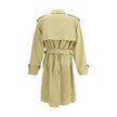 Beige Cotton CoatBurberry’s medium cotton gabardine Trench Coat is an iconic garment with a refined and functional design. Featuring raglan sleeves, double-breasted closure, epaulettes, chin strap and belt with a B-shaped buckle, it combines elegance and