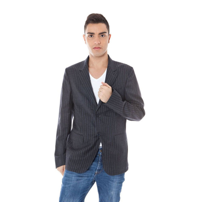 Gray Wool Men JacketIndulge in the timeless sophistication of Calvin Klein with this exquisitely tailored Classic Jacket. Designed for the modern man, it features long sleeves and a sleek button closure. With its impeccable construction boasting two inter