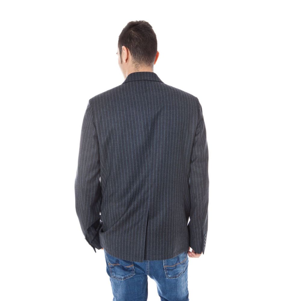Gray Wool Men JacketIndulge in the timeless sophistication of Calvin Klein with this exquisitely tailored Classic Jacket. Designed for the modern man, it features long sleeves and a sleek button closure. With its impeccable construction boasting two inter