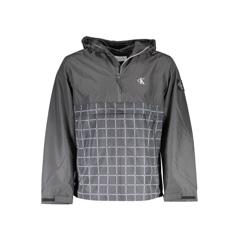 Black Polyester Men's JacketElevate your style quotient with the audaciously chic Calvin Klein sports jacket. Perfect for the modern man on the move, this black long-sleeved marvel features a snug hood, two practical pockets, and a sleek zippered front wi