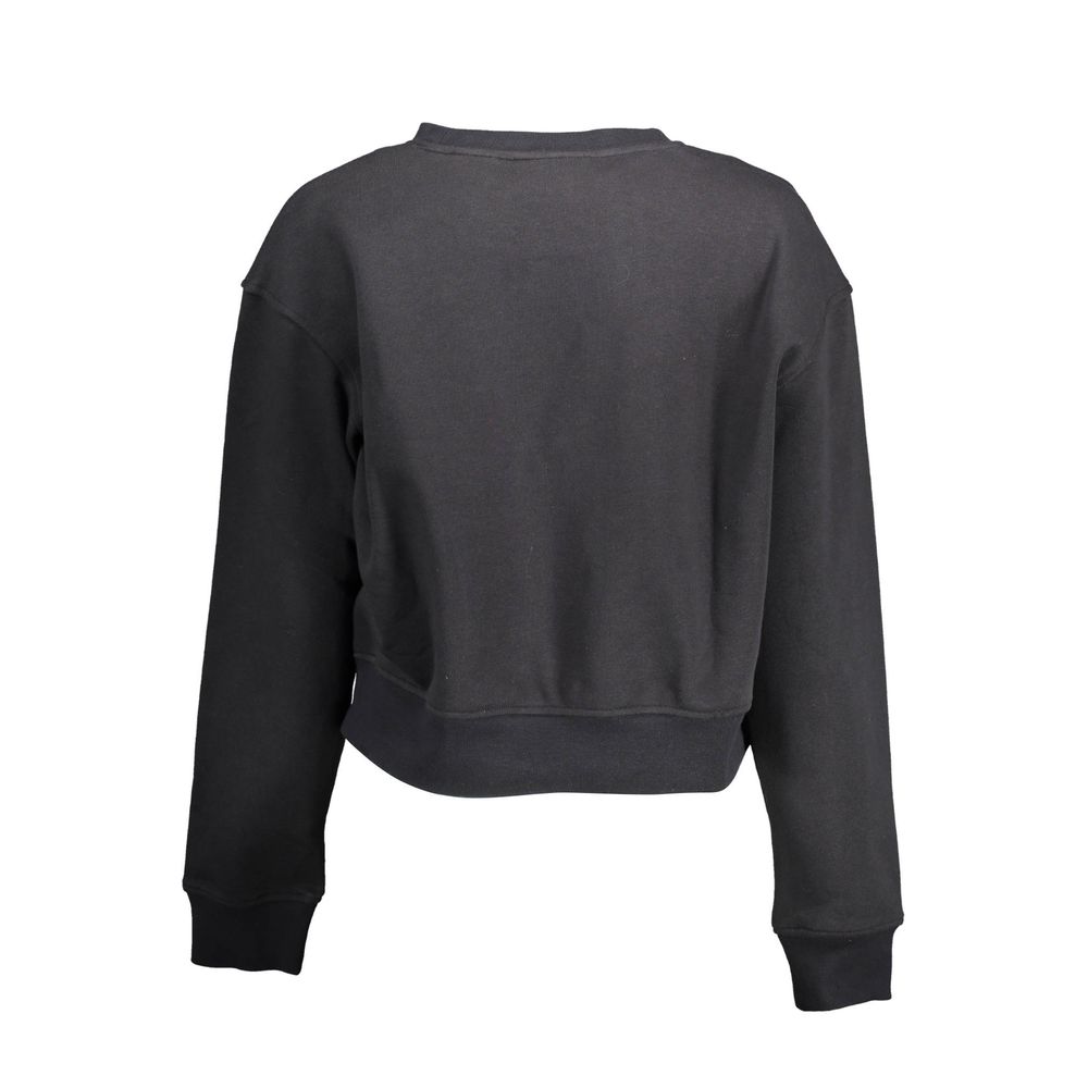 Black Cotton Women SweaterElevate your wardrobe with the Calvin Klein edge. This sleek sweatshirt, featuring long sleeves, a comfortable round neck, and an eye-catching print with the iconic logo, encapsulates modern sophistication. Crafted from a premium