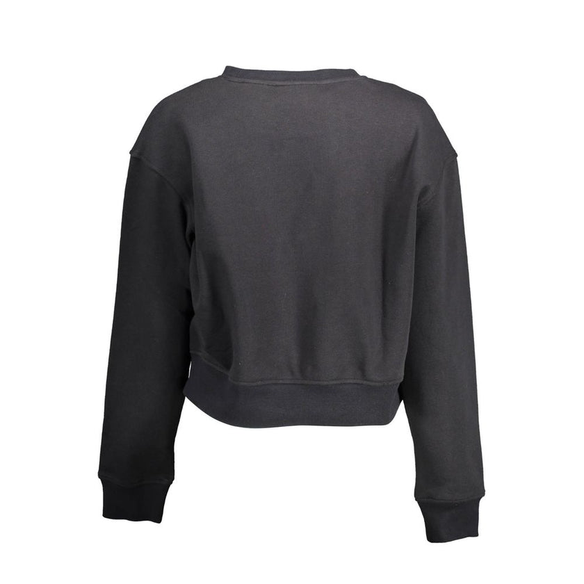 Black Cotton Women SweaterElevate your wardrobe with the Calvin Klein edge. This sleek sweatshirt, featuring long sleeves, a comfortable round neck, and an eye-catching print with the iconic logo, encapsulates modern sophistication. Crafted from a premium