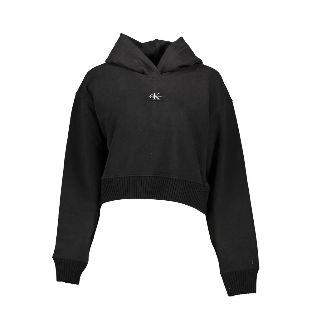 Black Cotton Women SweaterDiscover the epitome of urban sophistication with Calvin Klein’s sleek long-sleeved sweatshirt. This piece masterfully combines comfort with high-end fashion – featuring a cozy hood, striking contrasting details, and the iconic C