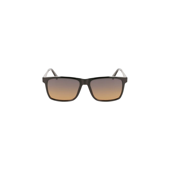 Black Plastic Men SunglassDiscover the epitome of sleek sophistication with these Calvin Klein sunglasses, crafted for the fashion-forward individual. Featuring a robust, square frame, these shades boast a commanding presence. The rich brown lenses not on