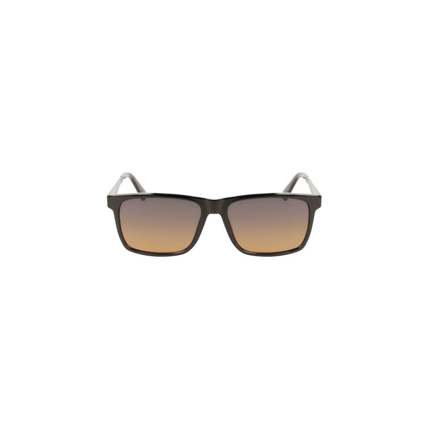 Black Plastic Men SunglassDiscover the epitome of sleek sophistication with these Calvin Klein sunglasses, crafted for the fashion-forward individual. Featuring a robust, square frame, these shades boast a commanding presence. The rich brown lenses not on