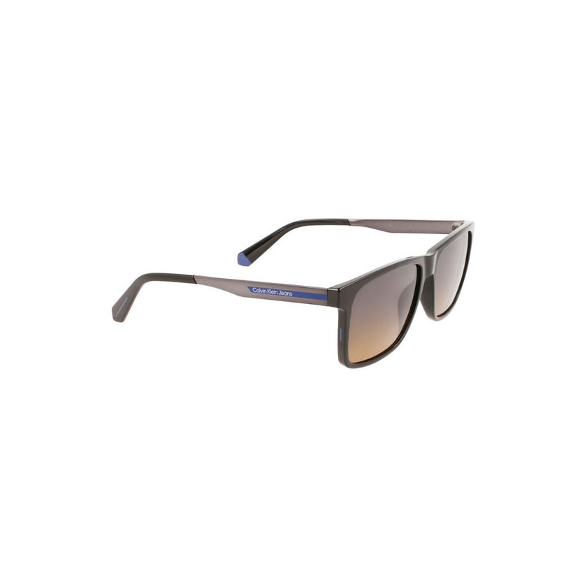 Black Plastic Men SunglassDiscover the epitome of sleek sophistication with these Calvin Klein sunglasses, crafted for the fashion-forward individual. Featuring a robust, square frame, these shades boast a commanding presence. The rich brown lenses not on