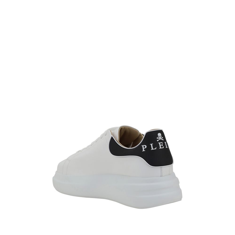 White Rubber Low Top SneakersPhilipp Plein’s leather Sneakers combine elegance and boldness with their distinctive design. The front lace-up closure ensures a secure fit, while the round toe offers comfort and practicality. The iconic contrasting monogram