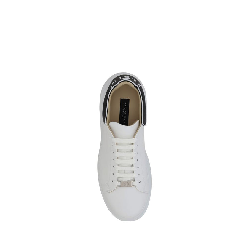 White Rubber Low Top SneakersPhilipp Plein’s leather Sneakers combine elegance and boldness with their distinctive design. The front lace-up closure ensures a secure fit, while the round toe offers comfort and practicality. The iconic contrasting monogram