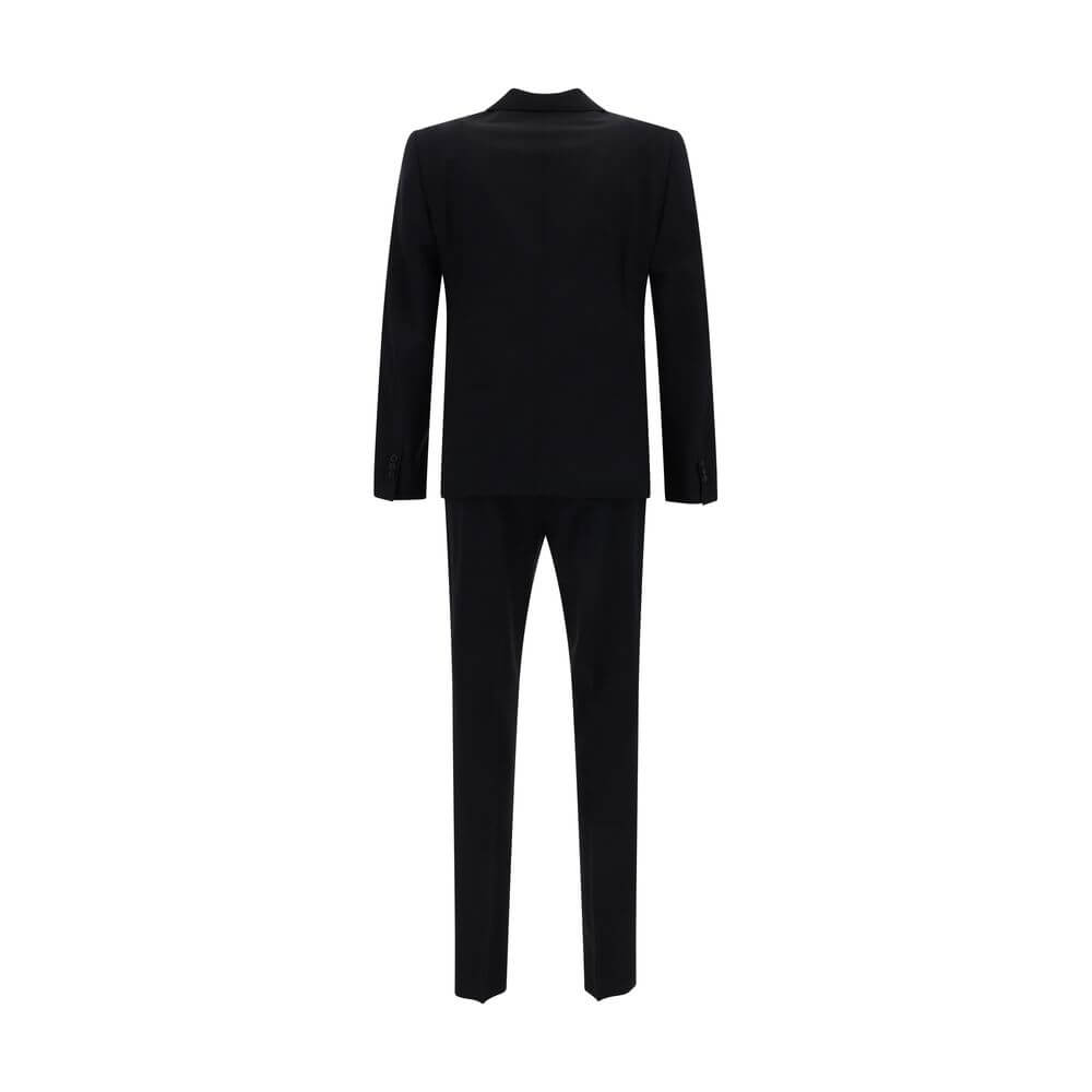 Black Fleece Wool Two-Piece SuitThe Dsquared2 virgin wool Suit, consisting of a jacket and trousers, is a timeless classic revisited with the brand’s distinctive style. The blazer jacket, made of pure wool, features a front closure with matching buttons,