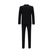 Black Fleece Wool Two-Piece SuitThe Dsquared2 virgin wool Suit, consisting of a jacket and trousers, is a timeless classic revisited with the brand’s distinctive style. The blazer jacket, made of pure wool, features a front closure with matching buttons,