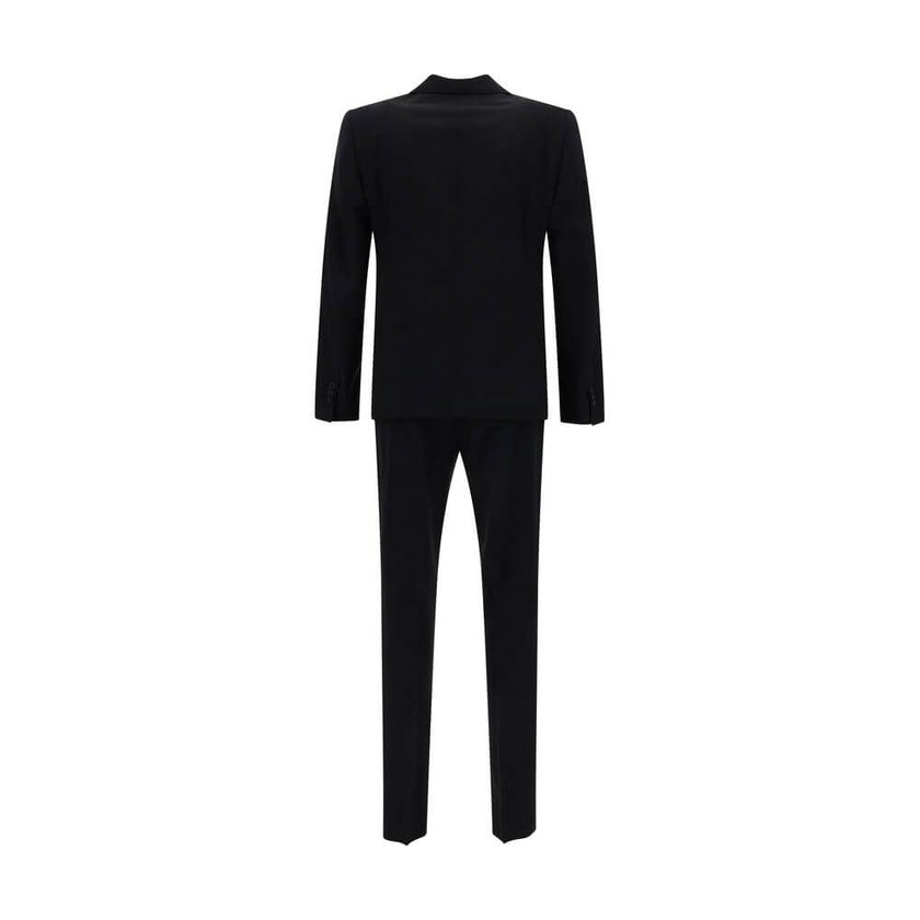 Black Fleece Wool Two-Piece SuitThe Dsquared2 virgin wool Suit, consisting of a jacket and trousers, is a timeless classic revisited with the brand’s distinctive style. The blazer jacket, made of pure wool, features a front closure with matching buttons,