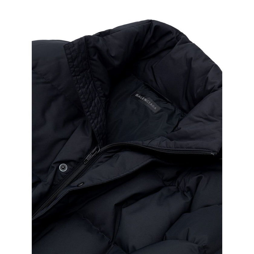 Black Polyamide Jackets & CoatBalenciaga Black Padded Puffy Jacket. Front fastening with zip and covered buttons, high collar, two side pockets closed with buttons, internal pocket with zip, elastic waist. On the back embroidered BB logo in white. Composi