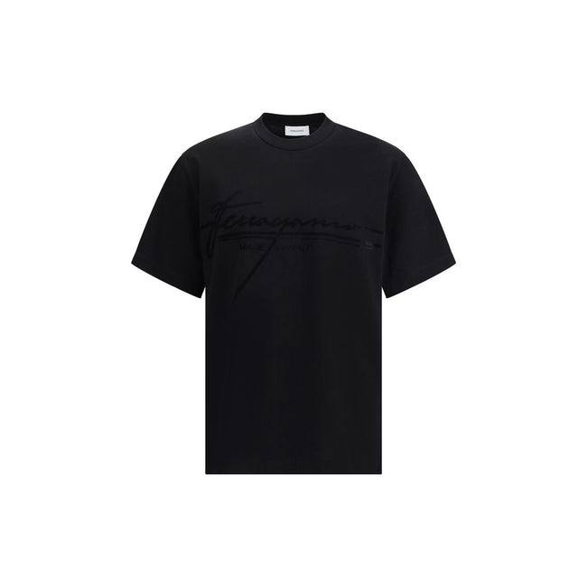 Black Cotton T-ShirtFerragamo’s cotton T-Shirt stands out for its minimal elegance and refined details. Made of soft cotton, it features a ribbed crew neck and the brand’s iconic tone-on-tone signature on the front for a discreet and sophisticated effect.