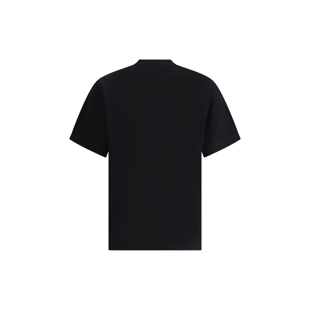 Black Cotton T-ShirtFerragamo’s cotton T-Shirt stands out for its minimal elegance and refined details. Made of soft cotton, it features a ribbed crew neck and the brand’s iconic tone-on-tone signature on the front for a discreet and sophisticated effect.