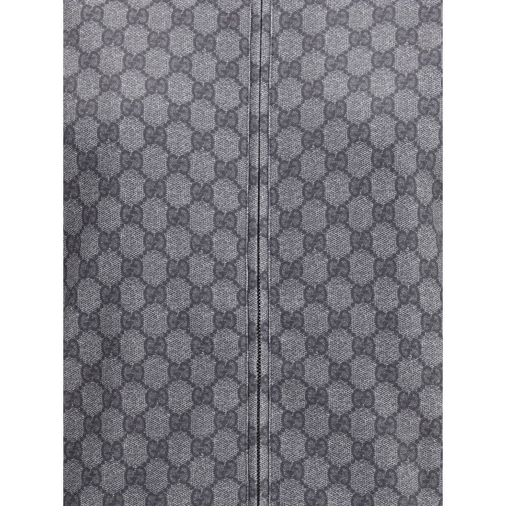 Gray Polyester SweatshirtGucci Sweatshirt with front zipper closure and ribbed high neck. The design is completed with ribbed cuffs and hem, as well as two practical side welt pockets. The iconic GG motif is repeated all-over, giving the garment a distinc