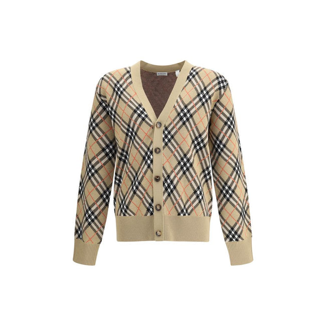 Beige Wool CardiganBurberry’s wool Cardigan is an essential piece with classic appeal, ideal for completing everyday looks with elegance. Crafted from soft wool, it features a V-neck, a front button closure and ribbed trim at the hem and cuffs for a comfo