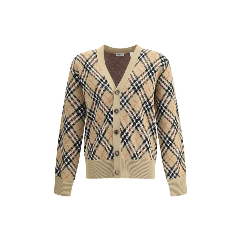 Beige Wool CardiganBurberry’s wool Cardigan is an essential piece with classic appeal, ideal for completing everyday looks with elegance. Crafted from soft wool, it features a V-neck, a front button closure and ribbed trim at the hem and cuffs for a comfo