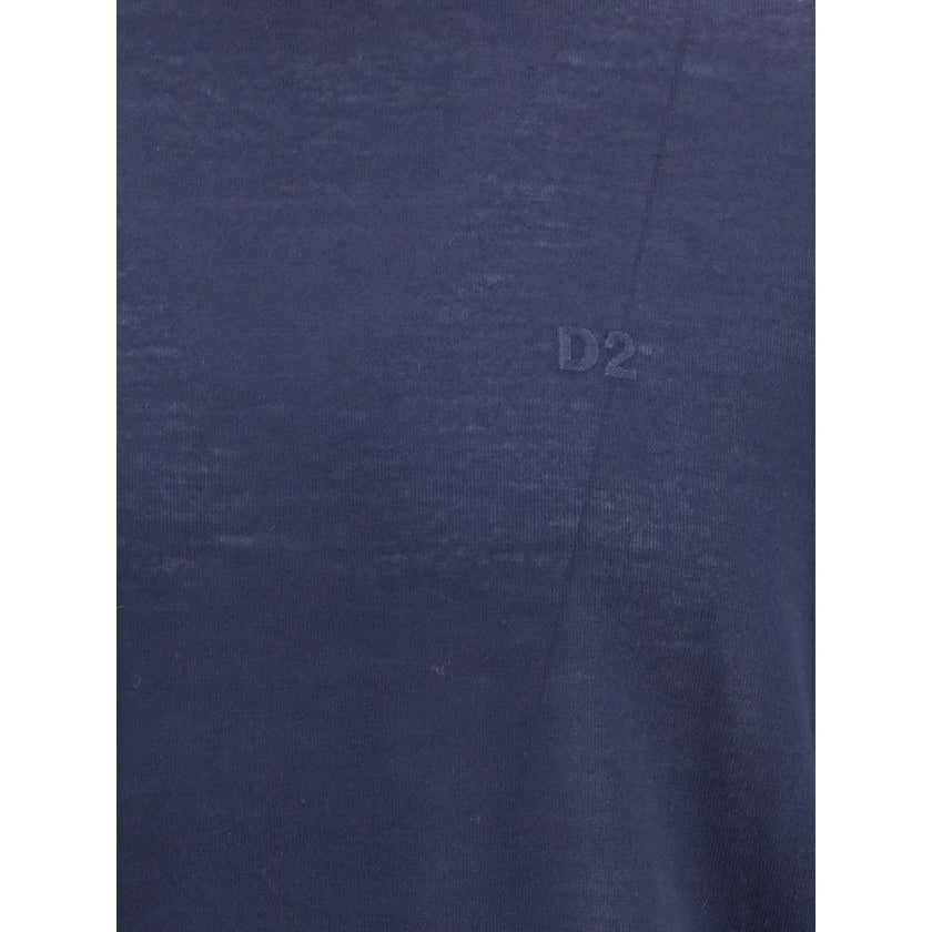 Blue Fleece Wool TurtleneckVirgin wool turtleneck Sweater by Dsquared2 features a soft high collar that can be turned up as desired. Ribbed cuffs and hem ensure a snug and comfortable fit. The front is embellished with the iconic tone-on-tone embroidered