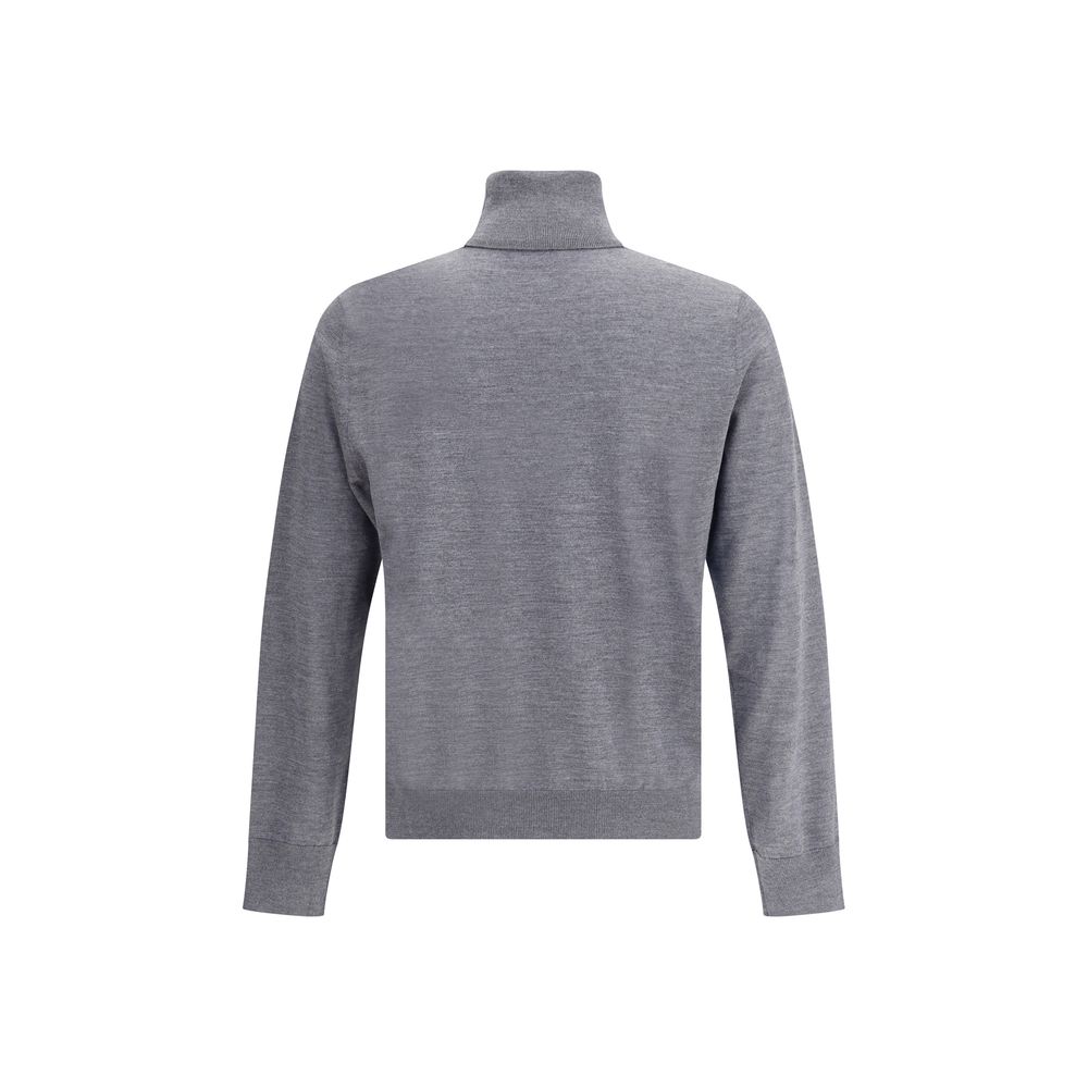 Gray Fleece Wool TurtleneckVirgin wool turtleneck Sweater by Dsquared2 features a soft high collar that can be turned up as desired. Ribbed cuffs and hem ensure a snug and comfortable fit. The front is embellished with the iconic tone-on-tone embroidered