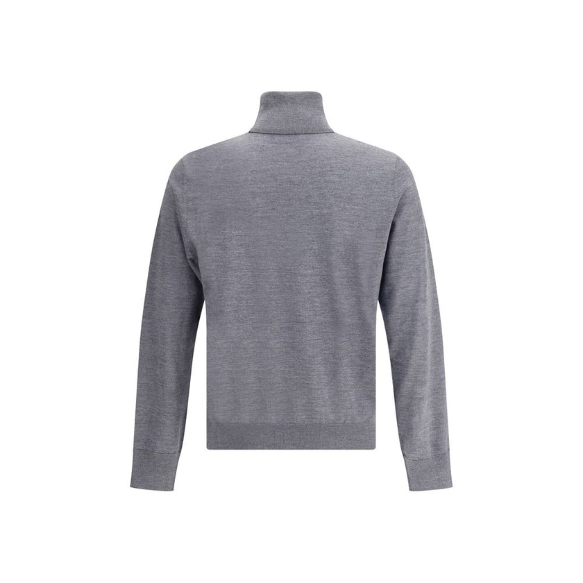 Gray Fleece Wool TurtleneckVirgin wool turtleneck Sweater by Dsquared2 features a soft high collar that can be turned up as desired. Ribbed cuffs and hem ensure a snug and comfortable fit. The front is embellished with the iconic tone-on-tone embroidered