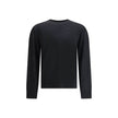 Black Fleece Wool SweatshirtVirgin wool Sweater by Dsquared2 features a ribbed crew neck for optimal comfort. It features the iconic D2 logo embroidered on the front, adding a distinctive detail. Ribbed cuffs and hem complete the garment for a snug and ne