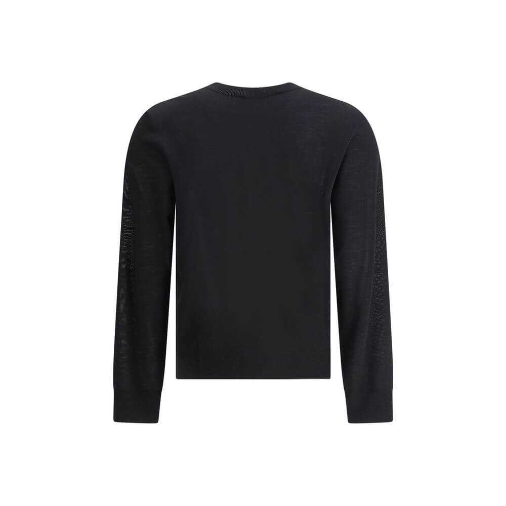 Black Fleece Wool SweatshirtVirgin wool Sweater by Dsquared2 features a ribbed crew neck for optimal comfort. It features the iconic D2 logo embroidered on the front, adding a distinctive detail. Ribbed cuffs and hem complete the garment for a snug and ne