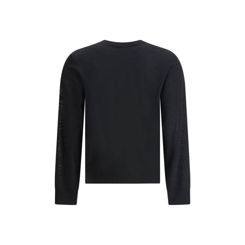 Black Fleece Wool SweatshirtVirgin wool Sweater by Dsquared2 features a ribbed crew neck for optimal comfort. It features the iconic D2 logo embroidered on the front, adding a distinctive detail. Ribbed cuffs and hem complete the garment for a snug and ne