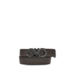 Brown Calf Leather Bos Taurus Regular BeltFerragamo’s Leather Belt features a buckle with the brand’s iconic Gancini logo, a distinctive symbol. In grained leather, this belt offers an elegant and versatile design, perfect for completing sophisticated, ev