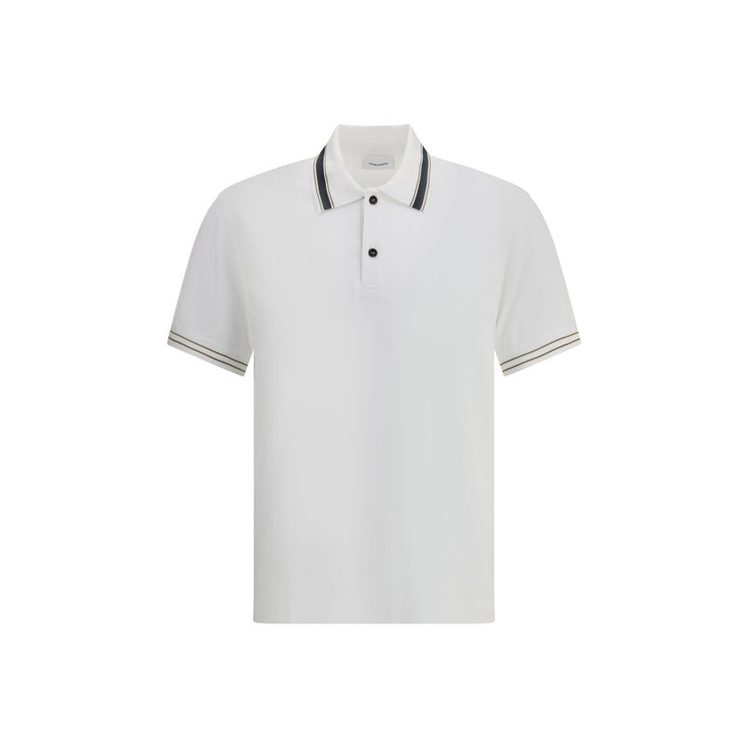 White Cotton Polo ShirtFerragamo’s Cotton Polo Shirt combines elegance with refined details. Featuring a classic collar with contrasting bands, it has a contrasting button closure and a refined embroidered monogram detail on the flap for a distinctive and