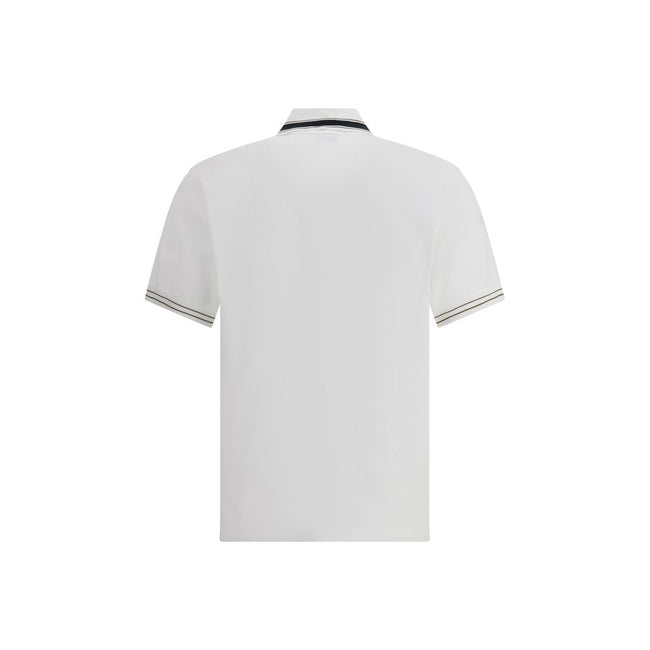 White Cotton Polo ShirtFerragamo’s Cotton Polo Shirt combines elegance with refined details. Featuring a classic collar with contrasting bands, it has a contrasting button closure and a refined embroidered monogram detail on the flap for a distinctive and
