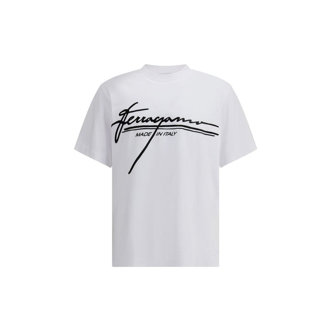 White Cotton T-ShirtFerragamo’s cotton T-Shirt is an essential piece with a clean, refined design. Featuring a ribbed crew neck, it features the brand’s iconic signature printed in contrast on the front for an understated yet distinctive look. Season: AW2