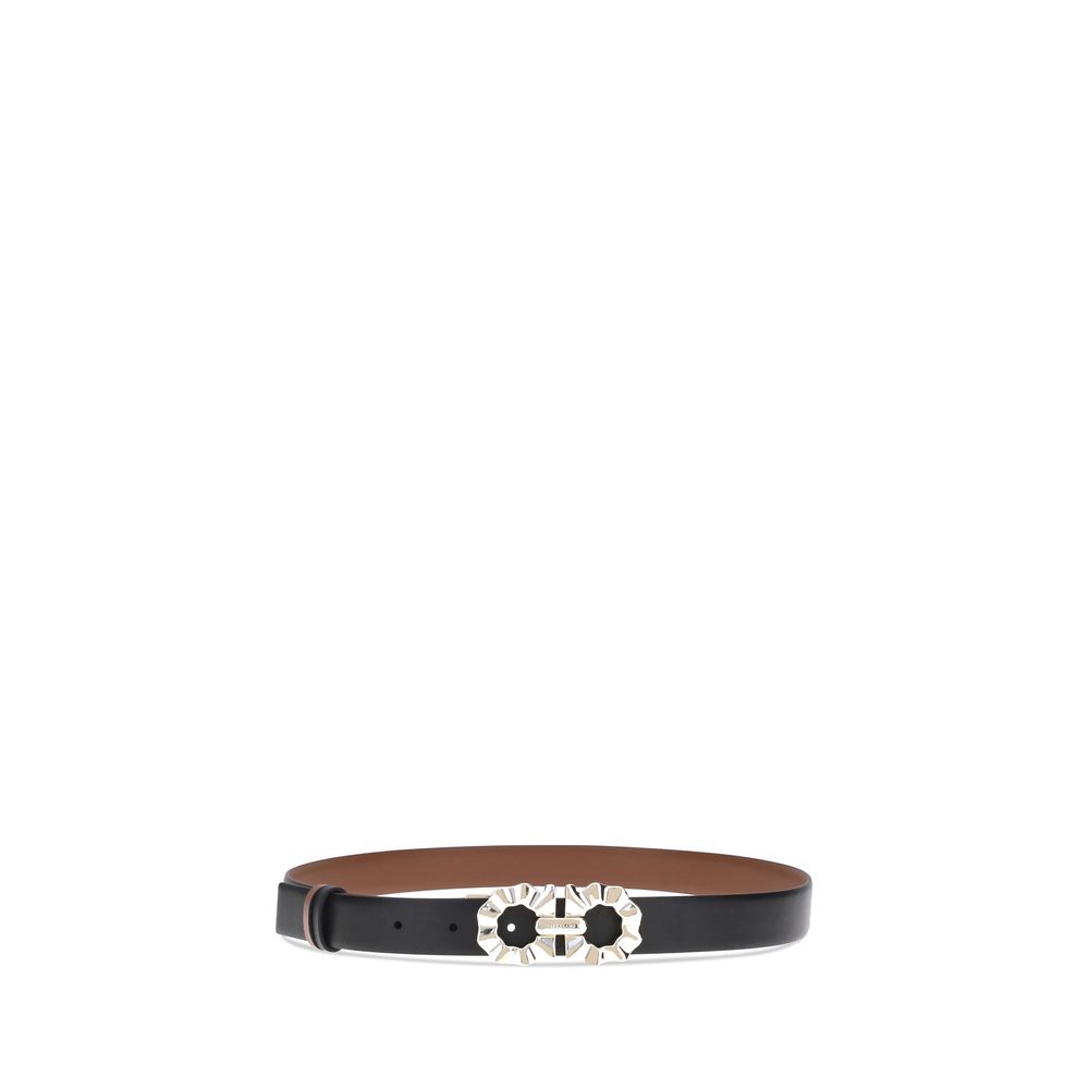 Black Calf Leather Bos Taurus Regular BeltFerragamo’s Gancini reversible Belt embodies the brand’s style with delicate femininity. Its two-tone, reversible design offers unparalleled versatility, allowing you to change your look with a simple gesture. The