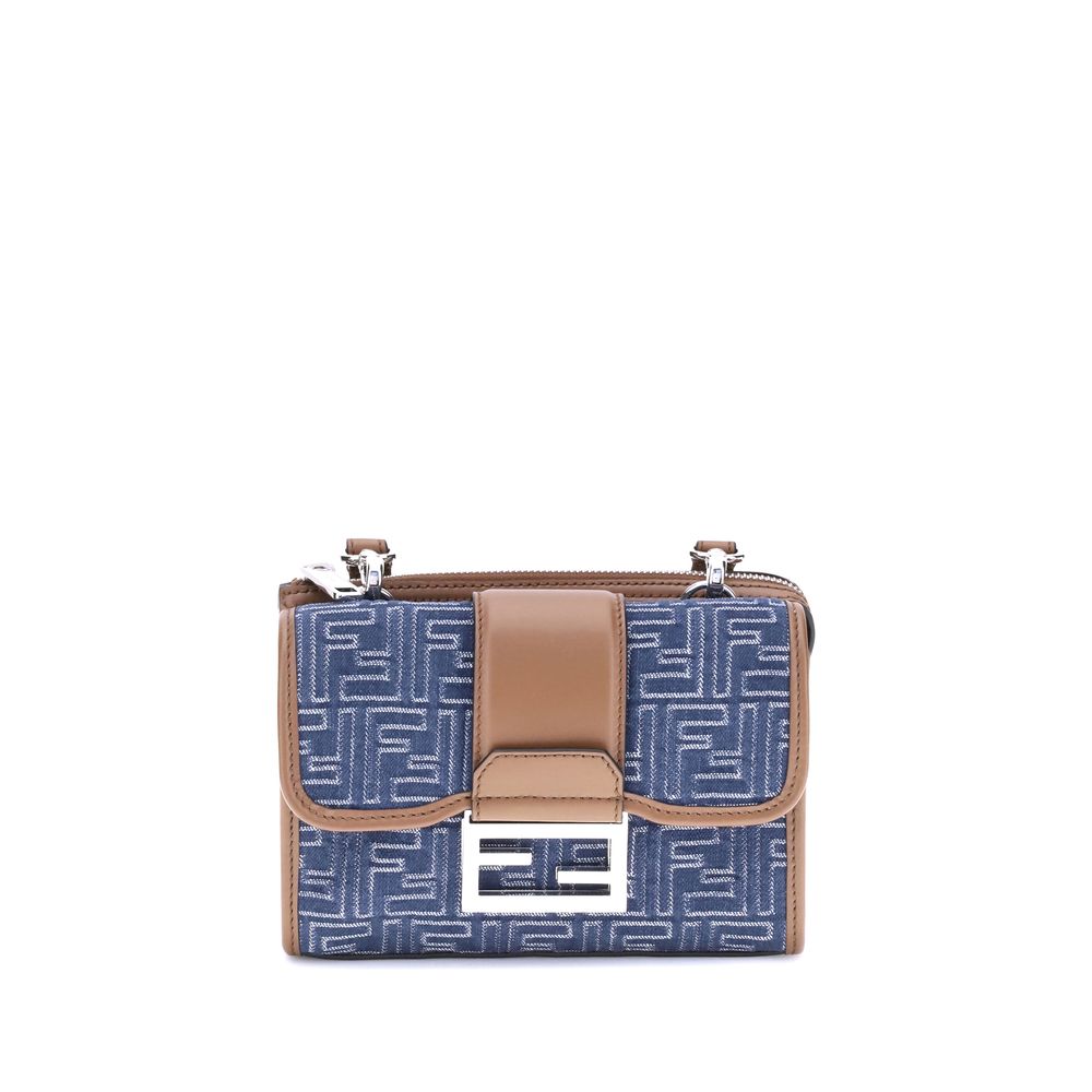 Blue Cotton Shoulder BagFendi’s Baguette Double Shoulder Bag made of denim-effect FF Jacquard is a practical and fashionable accessory, organized in two compartments, one with a square flap and FF magnetic closure, the other closed with a zipper. It featu