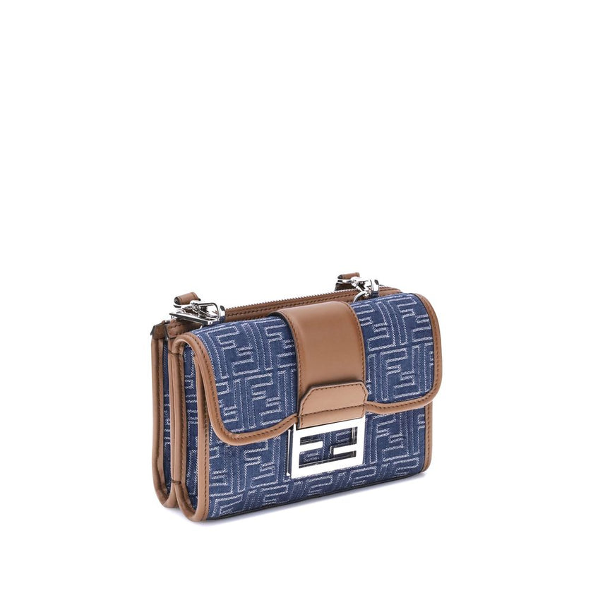Blue Cotton Shoulder BagFendi’s Baguette Double Shoulder Bag made of denim-effect FF Jacquard is a practical and fashionable accessory, organized in two compartments, one with a square flap and FF magnetic closure, the other closed with a zipper. It featu