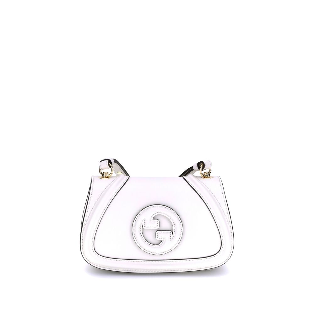 White Calf Leather Bos Taurus HandbagGucci’s Blondie Shoulder Bag is made of leather and features a stylish and functional design. It has an adjustable flat shoulder strap for optimal comfort and a magnetic flap closure on the front. On the back, a welt p