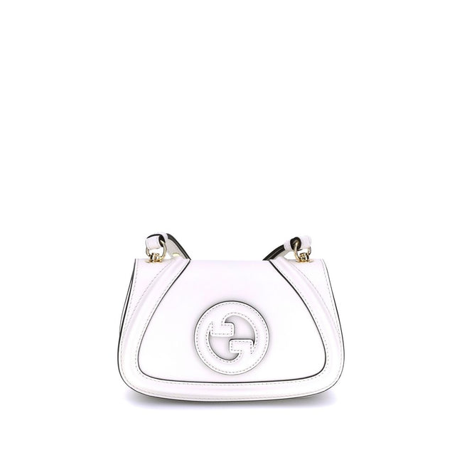White Calf Leather Bos Taurus HandbagGucci’s Blondie Shoulder Bag is made of leather and features a stylish and functional design. It has an adjustable flat shoulder strap for optimal comfort and a magnetic flap closure on the front. On the back, a welt p