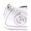 White Calf Leather Bos Taurus HandbagGucci’s Blondie Shoulder Bag is made of leather and features a stylish and functional design. It has an adjustable flat shoulder strap for optimal comfort and a magnetic flap closure on the front. On the back, a welt p